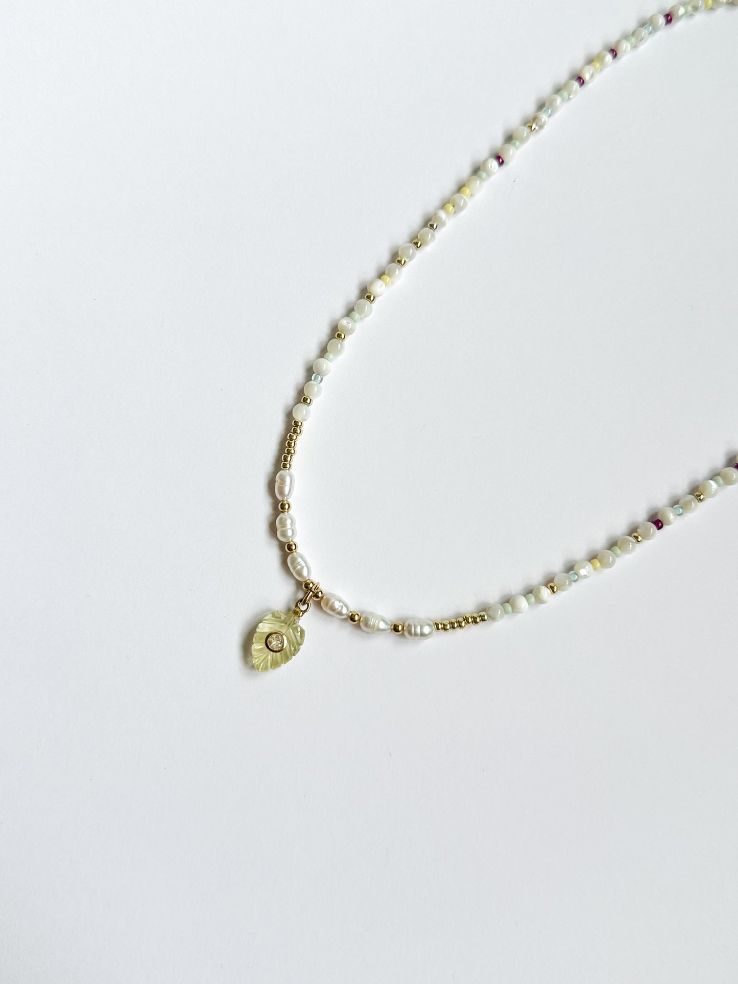 Moonstones with Carved Leaf Pendant