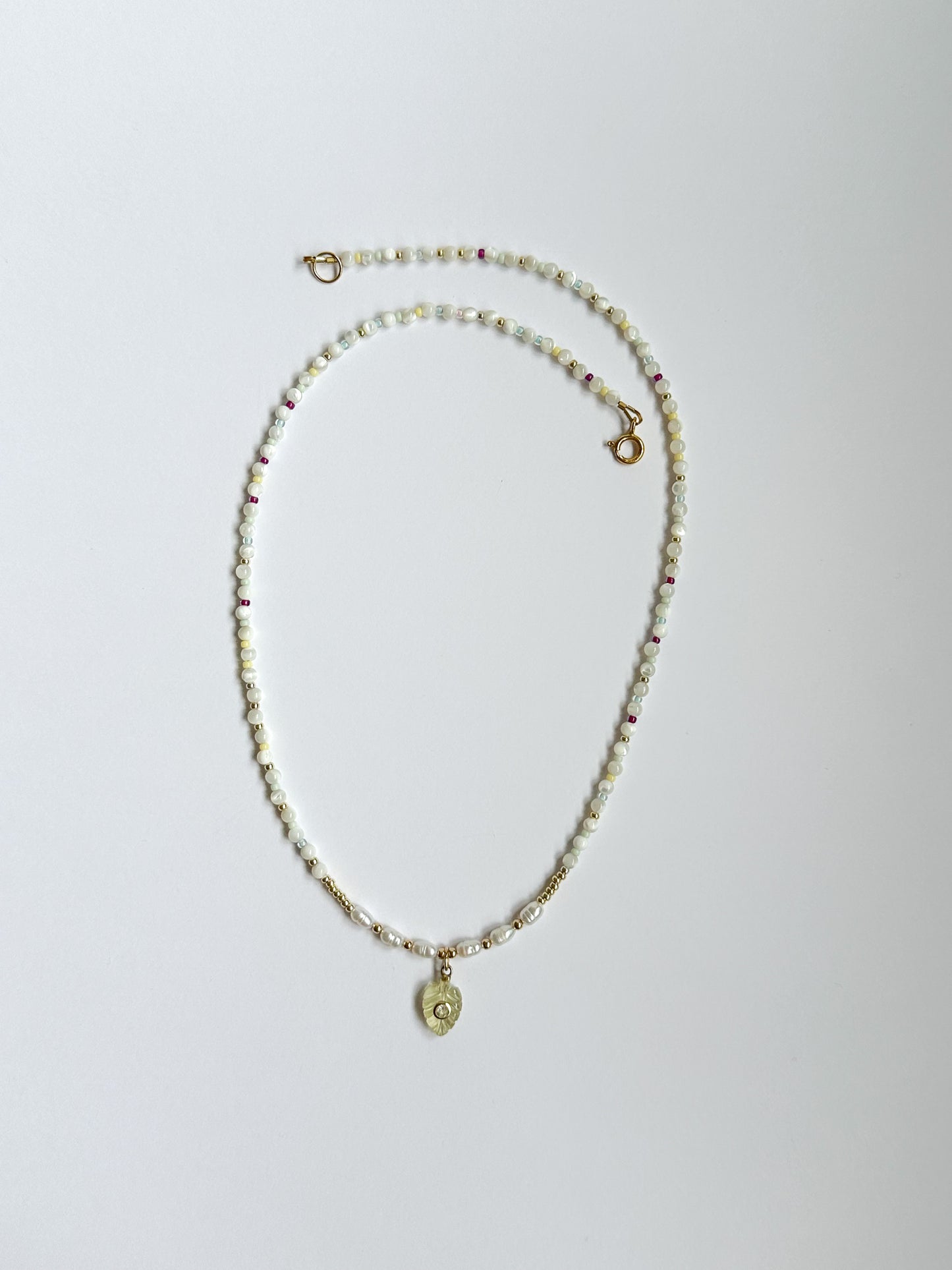 Moonstones with Carved Leaf Pendant